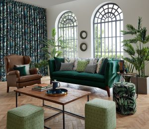 Emerald green fabrics and patterns inspired by nature in a biophilic inspired interior