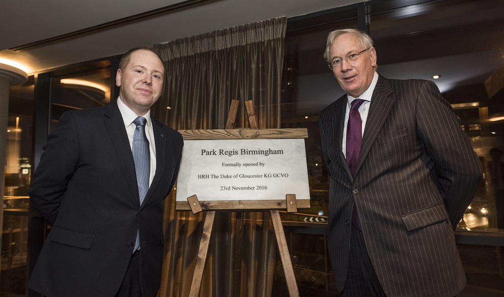 The Duke of Gloucester, Prince Richard unveils a plaque to commemorate the official opening of Park Regis Birmingham alongside general manager Robin Ford.