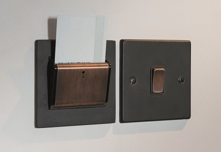Hamilton products welcome each guest into their room as a Hamilton hotel key card switch has been installed next to a single rocker switch that controls the lighting in the entrance area. Hamilton also helps make European guests feel at home with the inclusion of a European SCHUKO and dual USB 2-gang switched sockets within a specially manufactured plate installed above a vanity table in each room.