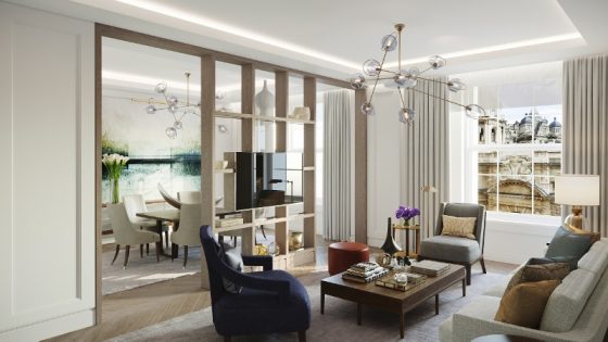 Modern suite with statement lighting and understated TV