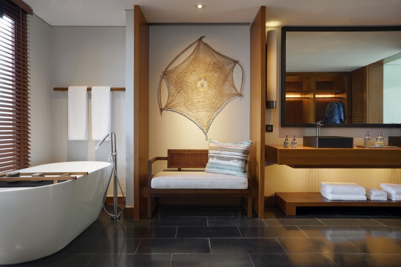Modern, sleek bathroom with focus on wood