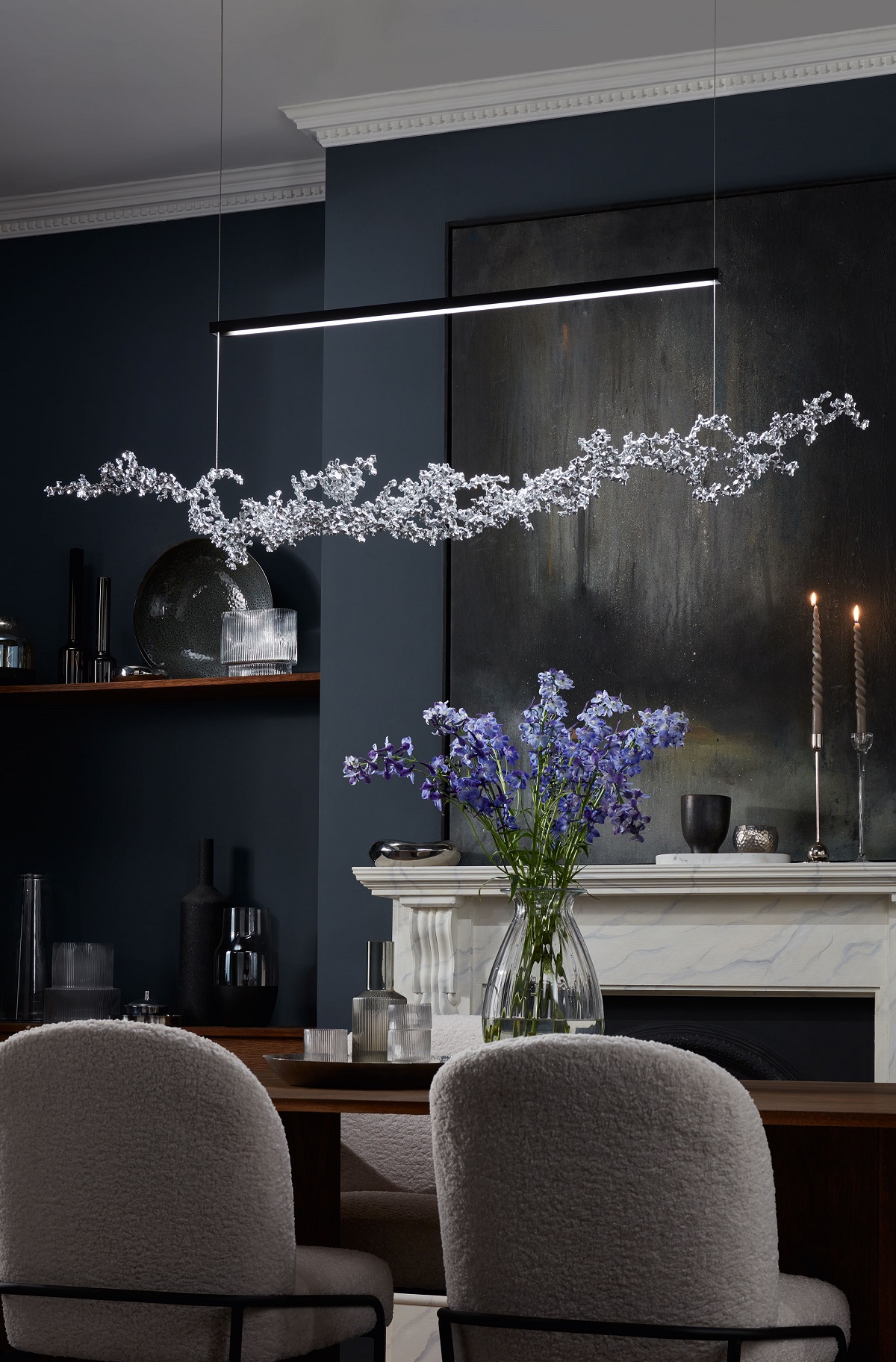 blossom pendant by Christopher Hyde suspended above a table