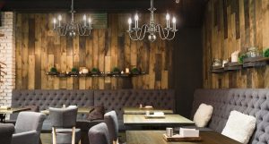 franklite chandelier set against rustic wooden walls in a restaurant