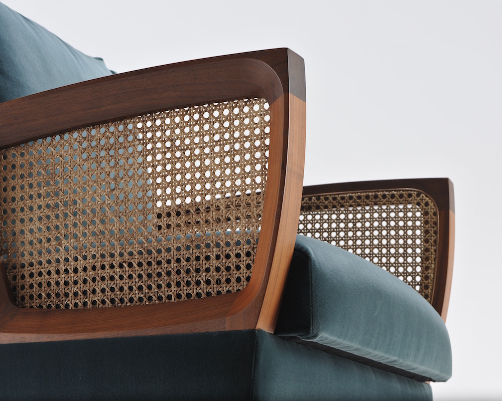A close-up of Morgan's Kaya Collection featuring authentic use of cane in the armrests