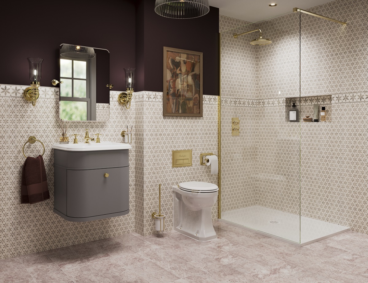 clear glass shower cubicle next to toilet and wall hung vanity