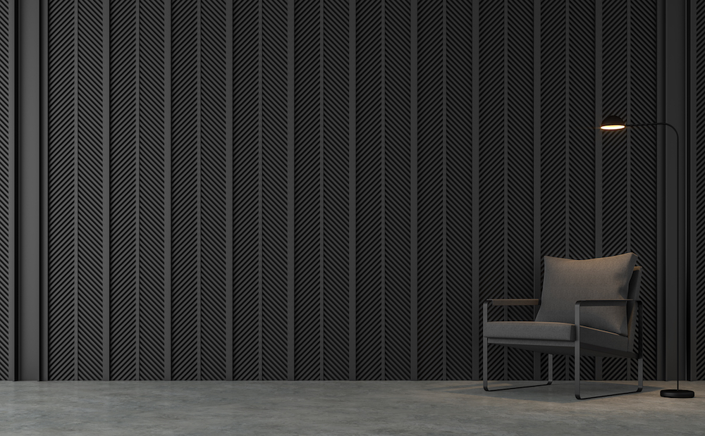 Modern loft living room with black steel slats 3d render.There are concrete floors , Decorate wall with pattern of black steel slats.Furnished with dark gray fabric chair.