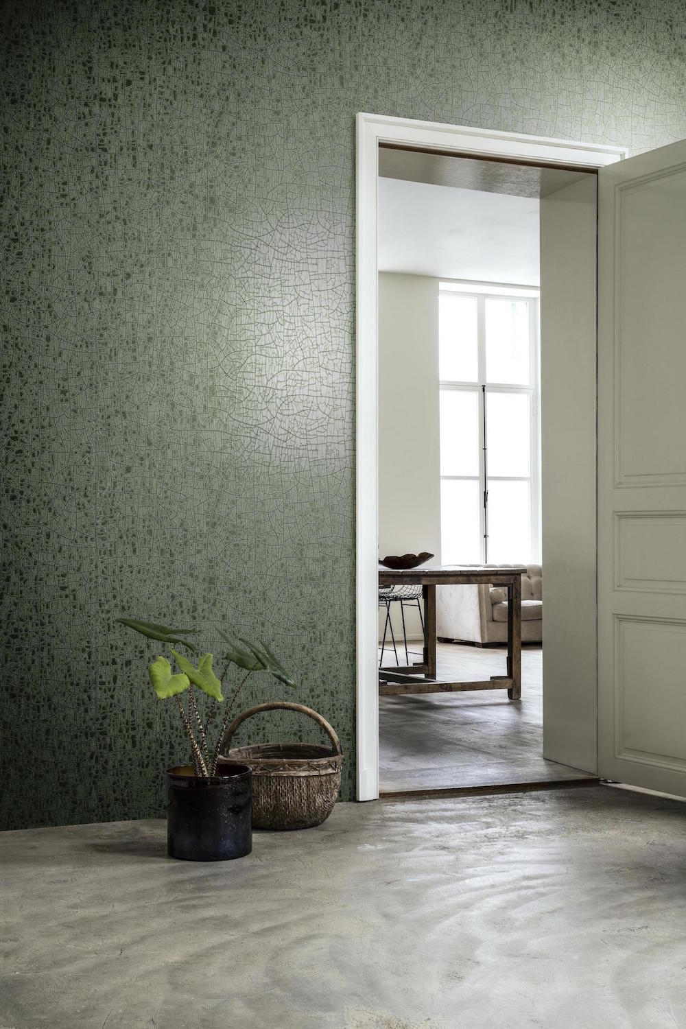 A bare room featuring Arte wallcovering