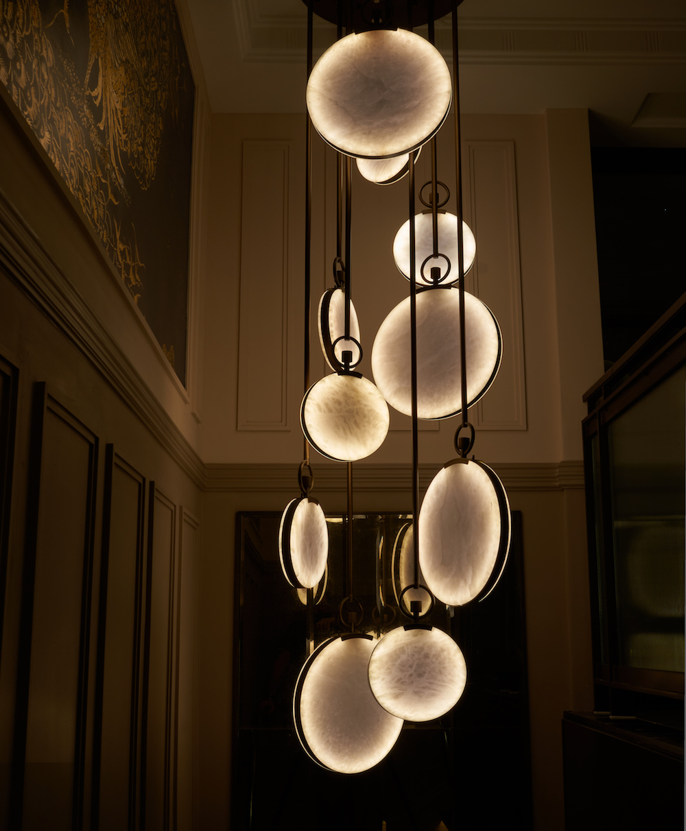 A cascading chandelier inside a luxury hotel in London
