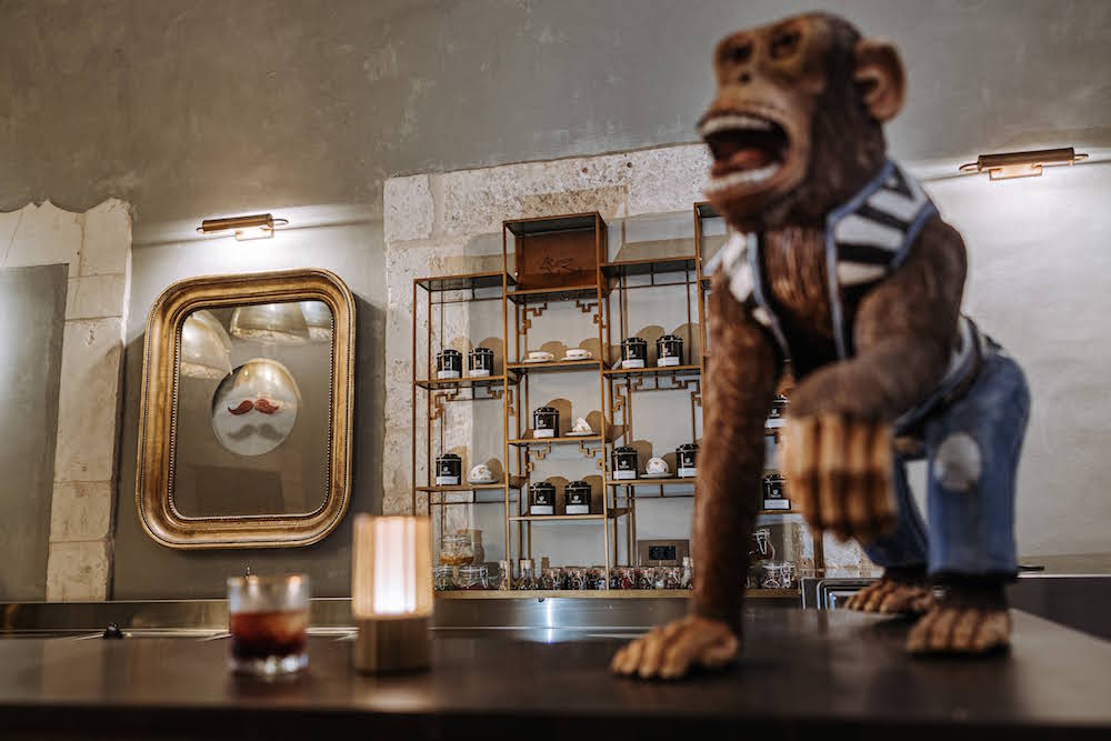 A artefact of a monkey on a bar
