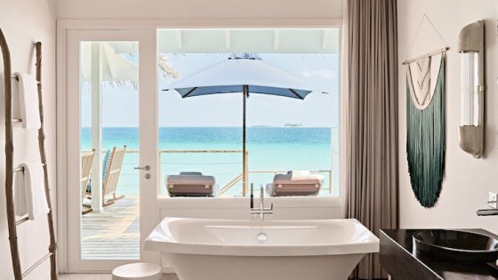 Image of villa overlooking sea from bathroom