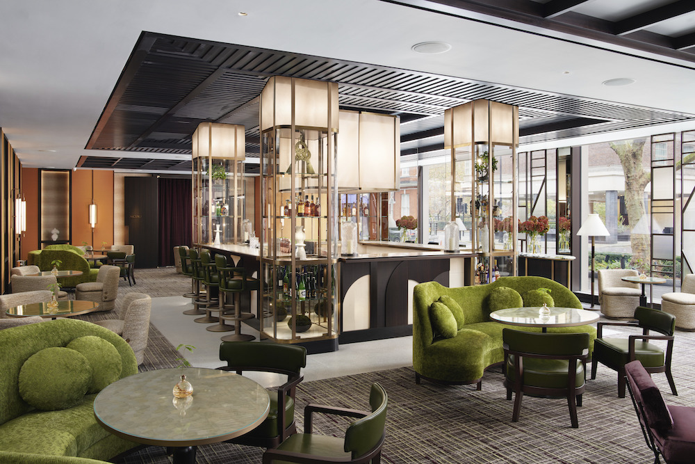 the lobby/lounge with green and purple furniture and modern bar at Nobu Hotel London Portman Square. Image credit: Jack Hardy