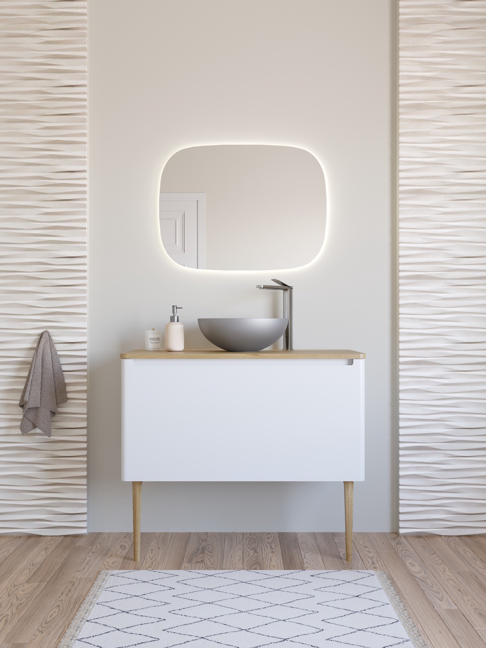Modern bathroom with lighted mirror