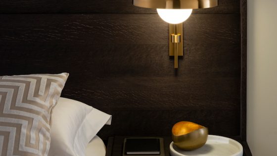 A bedside table lamp in hotel