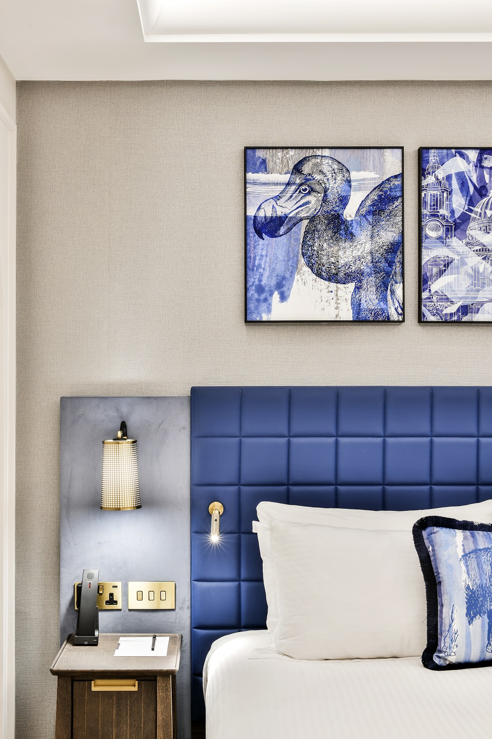 blue and white bedroom design for a lost and found hotel in london