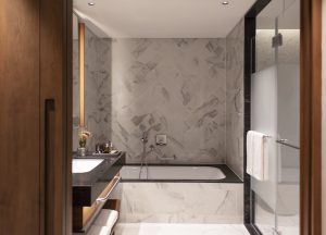 marble and wood hotel bathroom in tel aviv David Kempinski