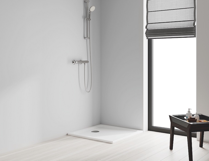 Minimal white shower with wood accents and GROHE Tempesta 100 shower rail set - C2C Certified