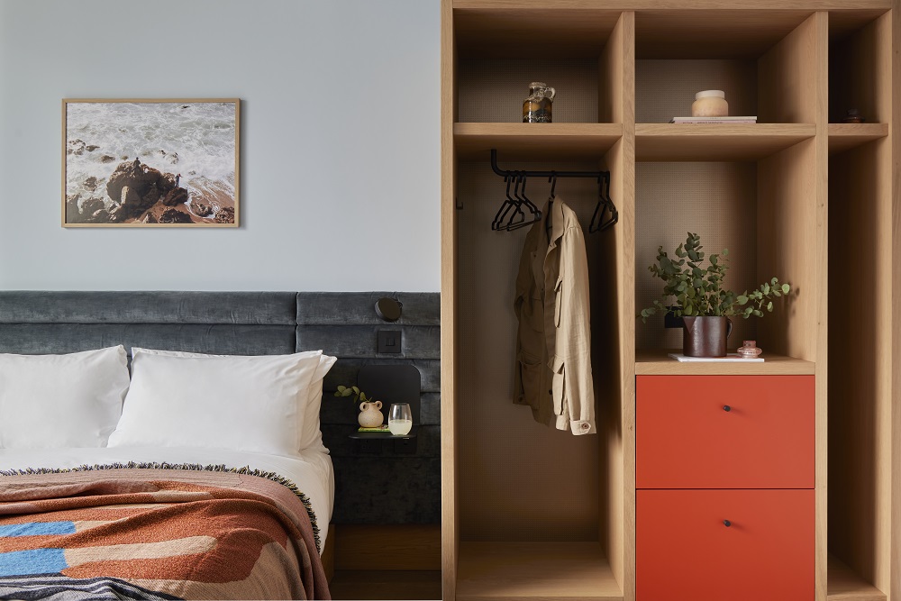 graphic bedroom design inblue and orange at Beckett Locke hotel