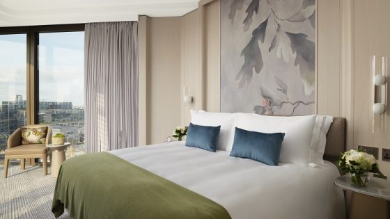 hotel suite at Pan Pacific London with bespoke bed overlooking london cityscape