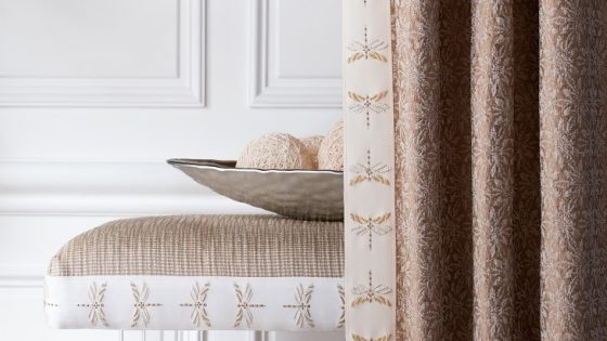 natural tones and textures of curtains with dragon fly trim from samuel and sons