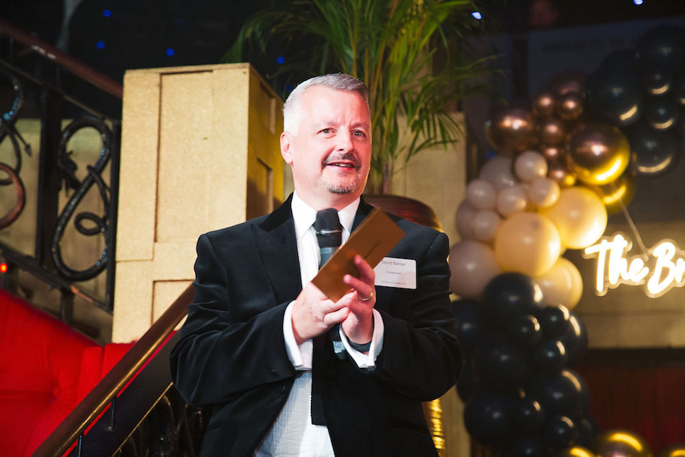 Crosswater's David Balmer presenting the award for Outstanding Contribution to the Hospitality industry