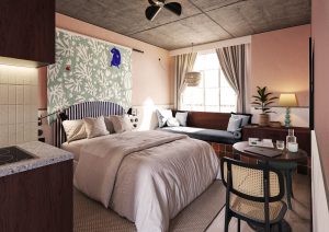  hotel guestroom design with fabric wall hanging and headboard