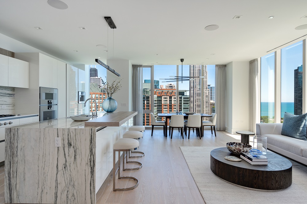 white, marble and wood surfaces in st regis residences chicago