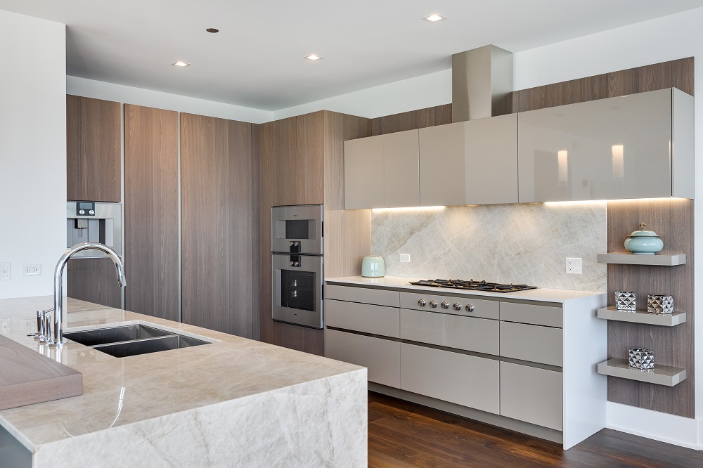 marble, wood and white high spec kitchen at St Regis Residences Chicago
