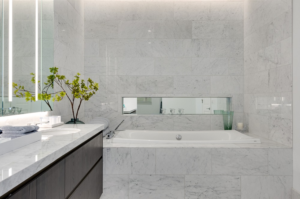 contemporary bathroom design in muted palette at St Regis Residences Chicago
