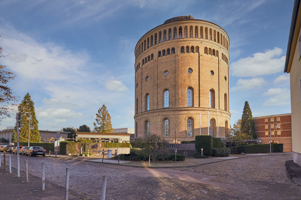 the historic water tower that is now the hilton curio collection hotel wasserturm