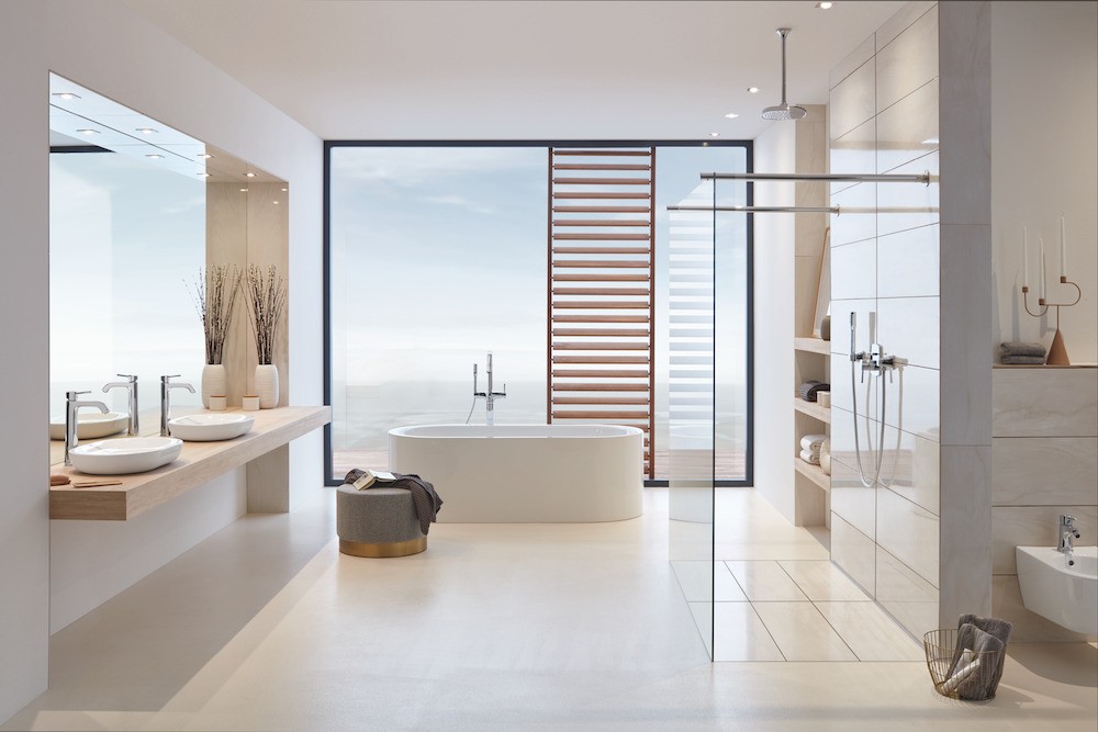 GROHE bathroom lifestyle shot featuring Grandera shower, tap and bath filler