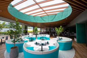 turquoise and white design of the restaurant in HOMA phuket