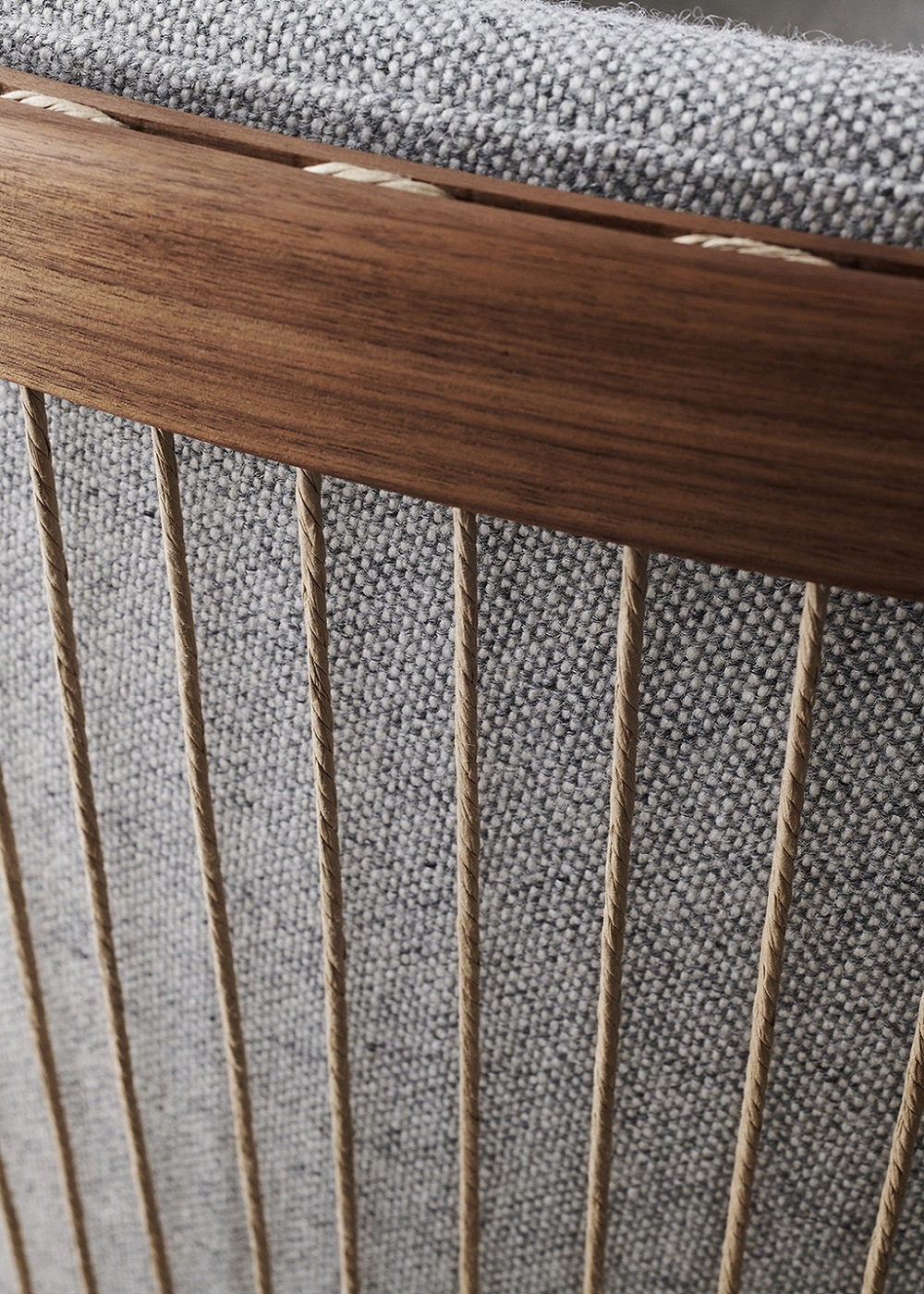 wood and cord detail of sideways sofa by Carl Hanson & son