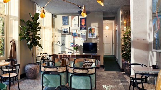 comfortable seating and vintage lighting in coco cafe in coco hotel paris