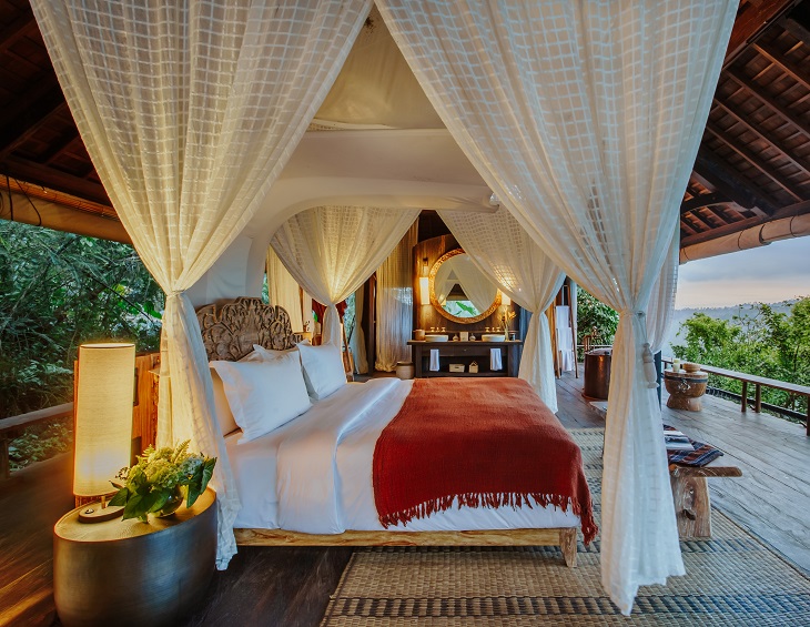 open air jungle bedroom in banyan tree group hotel