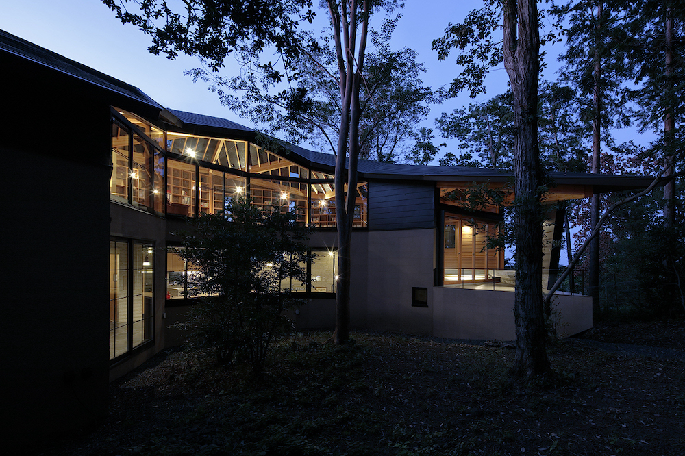 Exterior of PHASE DANCE, an architectural structure in the forest in Japan