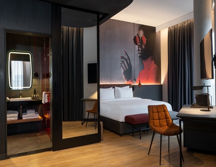 Radisson guestroom with dramatic black and red decor at Radisson RED Rosebank south Africa