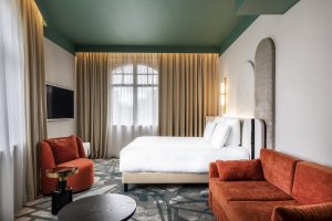 Accor Hotel guestroom detail with orange sofa