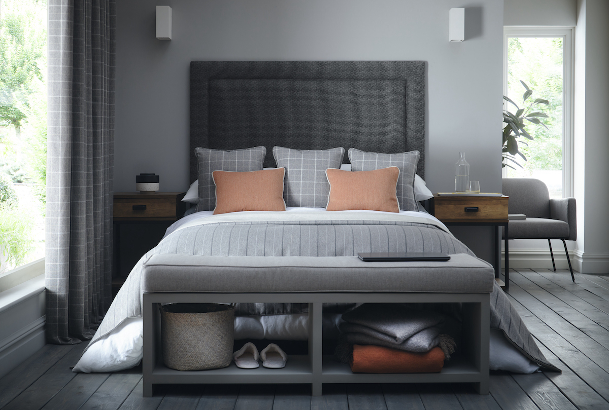A modern bedroom with Burlington Clarke and Clarke fabrics