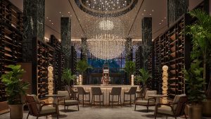chandelier in the lobby and bar in four seasons private residences new orleans