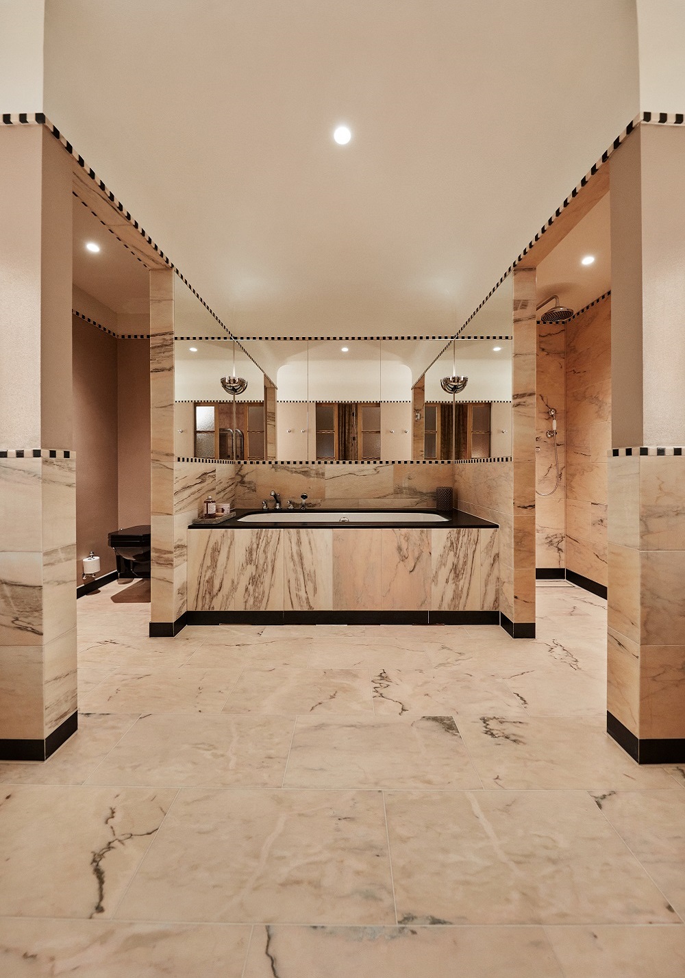 glamourous marble bathroom in guestroom at Sommerro Hotel
