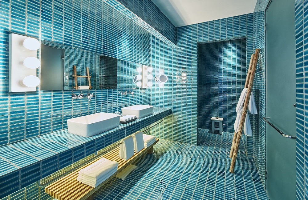 deep turquoise tiles in bathroom at COMO Point Yamu designed by Paola Navone