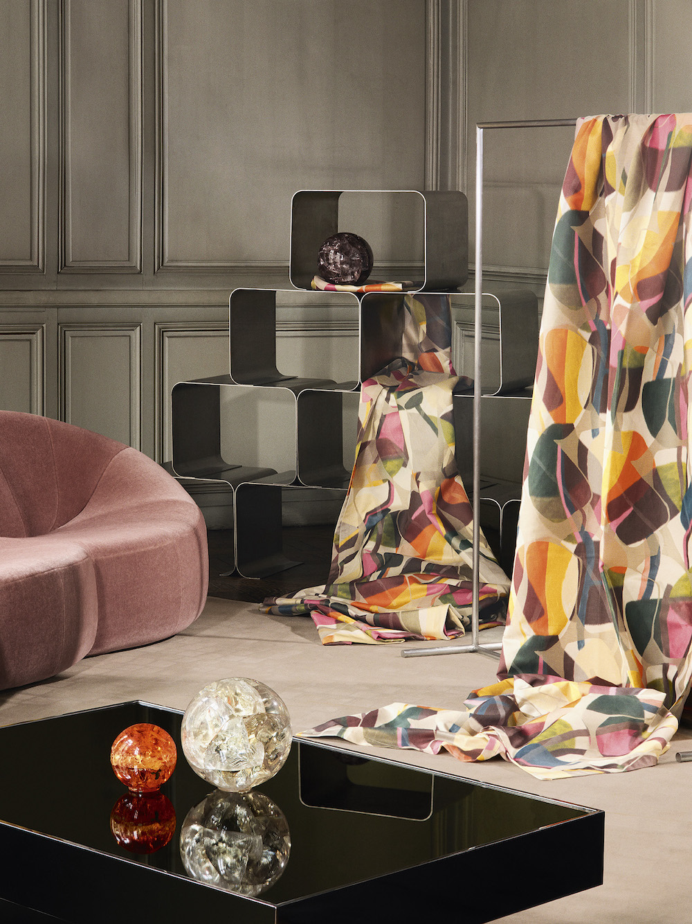 Various textiles next to luxury sofa