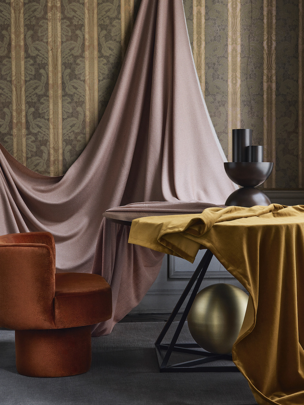 Various textiles draped over tables