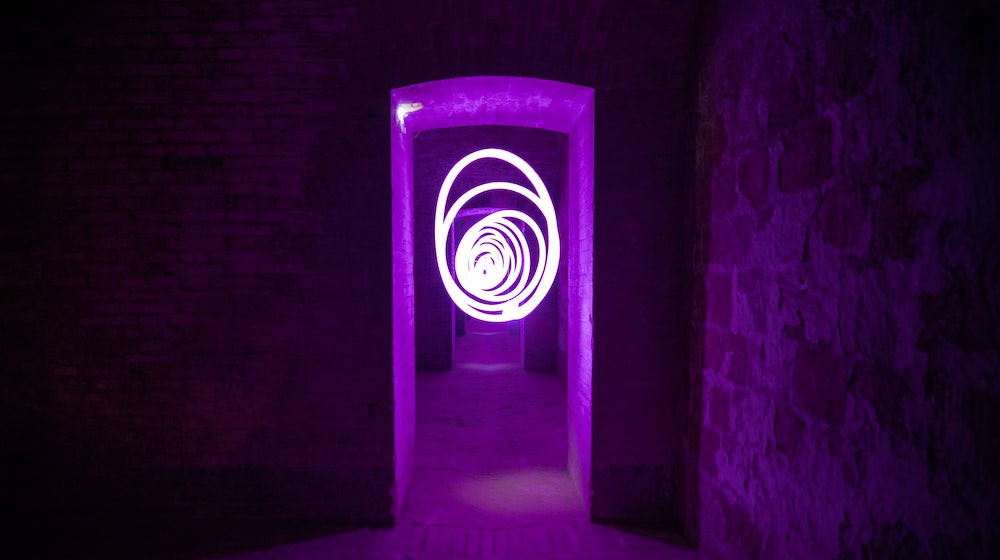A creative lighting installation inside a doorway