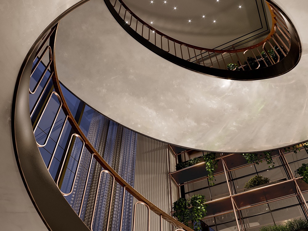 grand architectural spiral staircase at Raffles Boston Back Bay hotel
