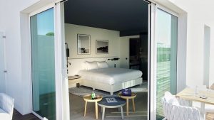 guestroom opening onto a private terrace at Hotel Indigo in France