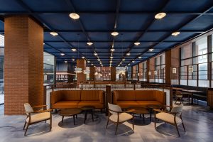 cobalt blue and brick combine in restaurant space in Hyatt Unbound Taoxichuan