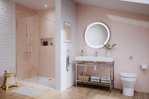 pink and cream bathroom with painted brick and tiled walls and Britton bathroom fittings