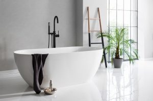 minimalist bathroom design with freestanding bath by Crosswater
