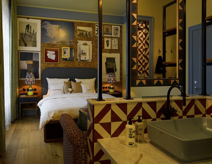 eclectic and layered guestroom design at 25hours hotel in Copenhagen